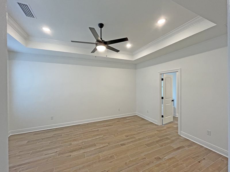 Spacious, unfurnished interior of a new home in Bird Song at Hammock Bay, Freeport (Image 15).