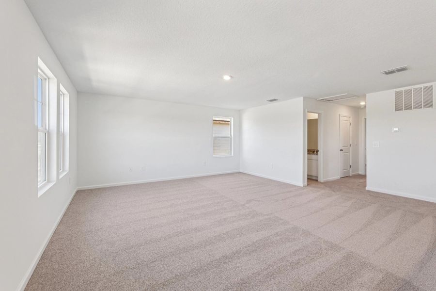 Representative unfurnished interior of a home built from the Ellis by Starlight Homes in Hawks Run, Kissimmee (Image 17).