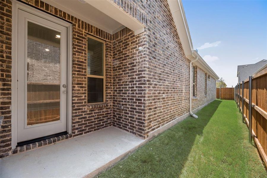 Front exterior of a new home in Arbors at Legacy Hills, Celina, TX, highlighting curb appeal (Image 16).