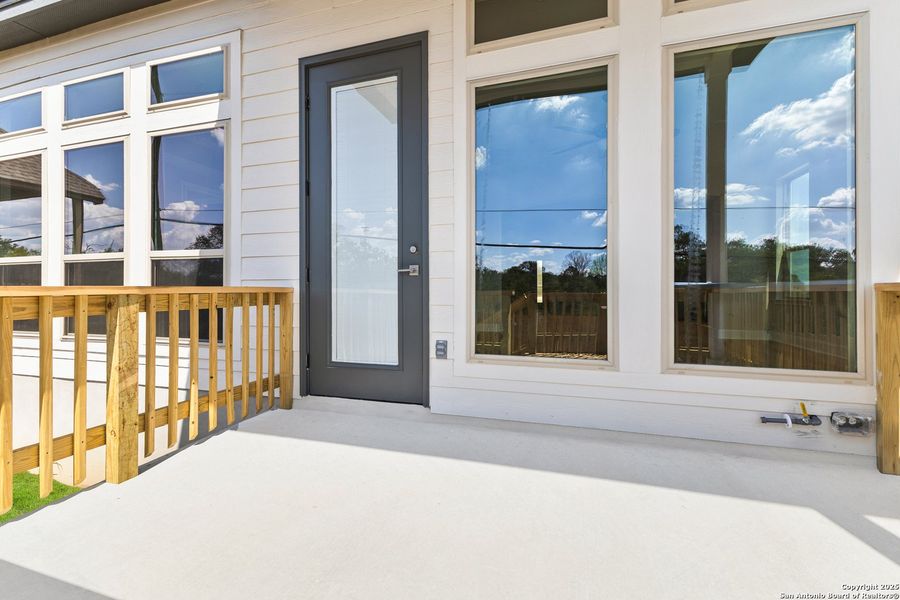 Exterior details and patio area of a home in The Enclave at Potranco Oaks, Castroville (Image 23).