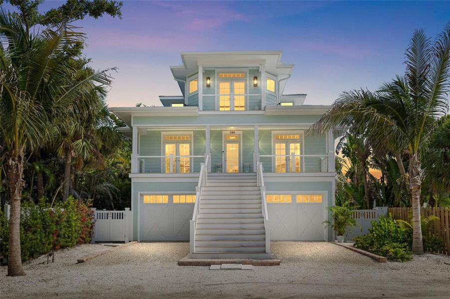 Front exterior of a new home in , Boca Grande, FL, highlighting curb appeal (Image 25). Front exterior of a new home in , Boca Grande, FL, highlighting curb appeal (Image 25).