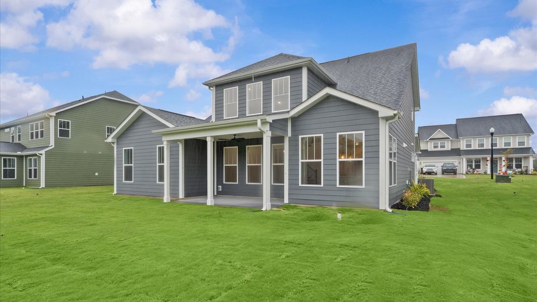 Exclusive rear covered porch with accomplished detail and elevated outdoor living potential