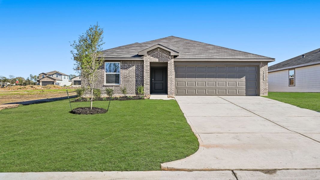 Representative exterior photo of a completed home built from the Anderson by D.R. Horton in Lexington Heights, Willis, TX (Image 18). Representative exterior photo of a completed home built from the Anderson by D.R. Horton in Lexington Heights, Willis, TX (Image 18).