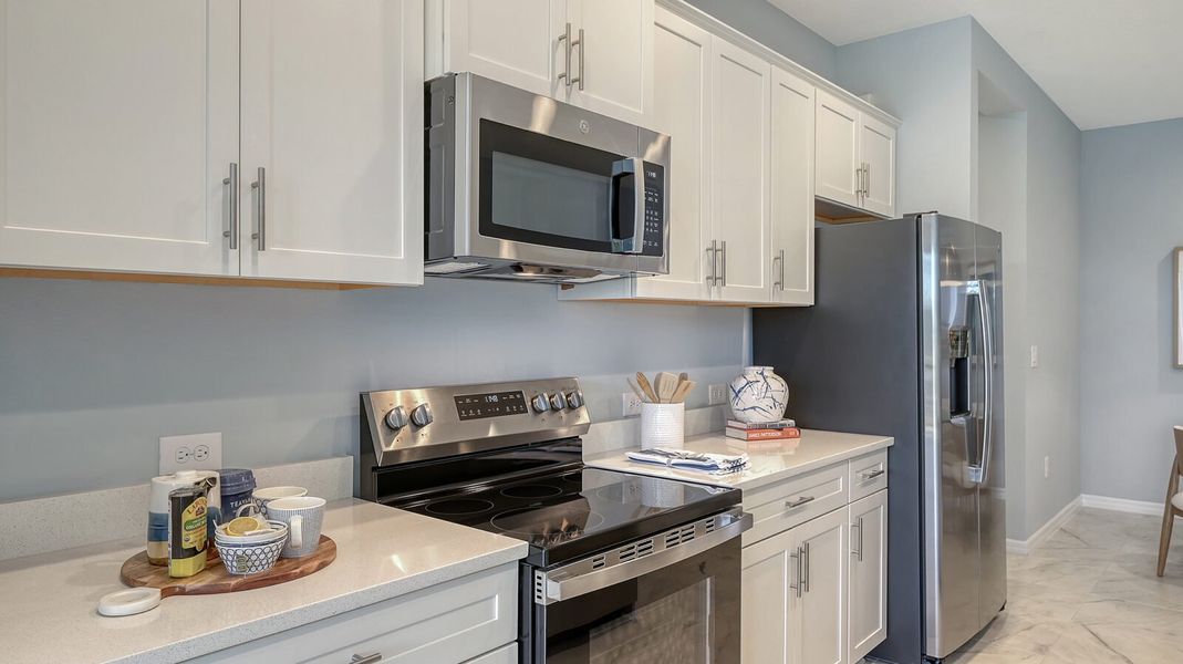 Representative furnished interior of a home built from the Avery by Neal Communities in Grand Park, Sarasota (Image 15).