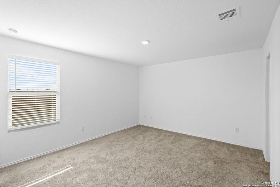Spacious, unfurnished interior of a new home in Ruby Crossing: Cottage Collection, San Antonio (Image 10).