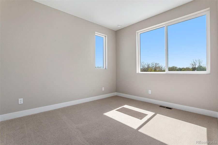 Spacious, unfurnished interior of a new home in Prelude at TAVA Waters, Denver (Image 28).