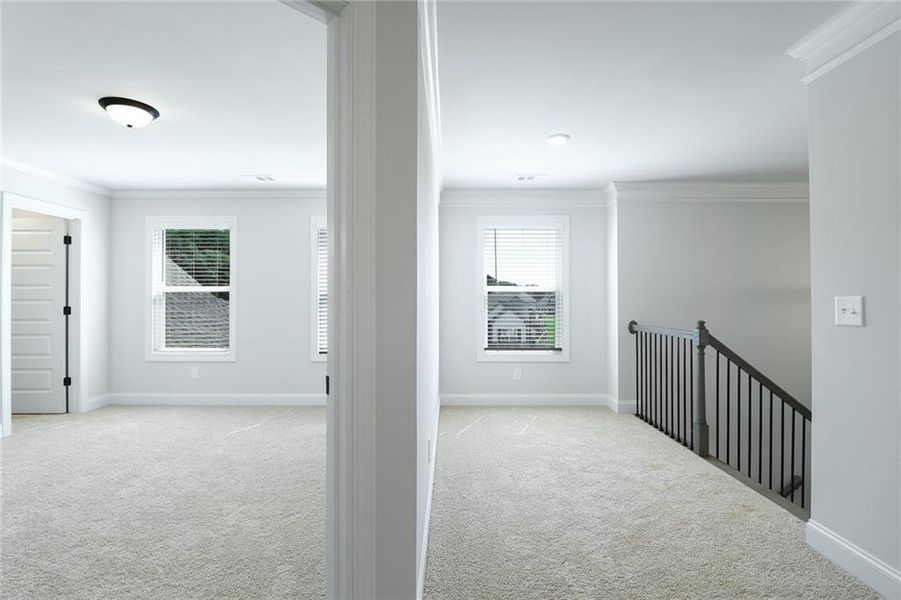 Spacious, unfurnished interior of a new home in Calgary Downs, Winder (Image 17).