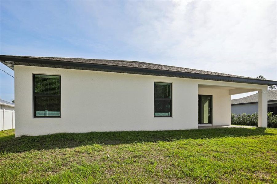 Exterior details and patio area of a home in , Port Charlotte (Image 27).