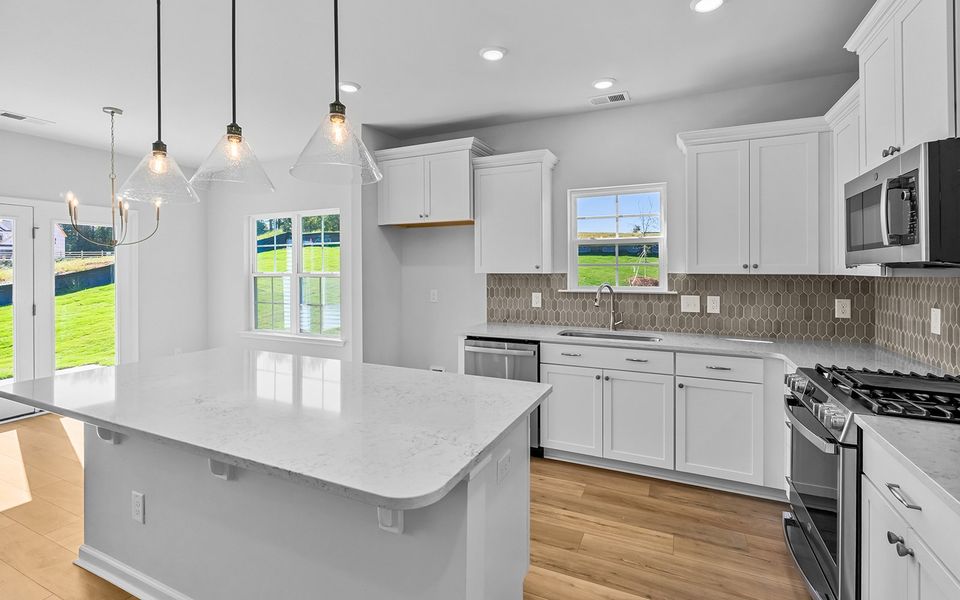 Furnished interior view inside a new home in Fieldstone, Lexington (Image 8).