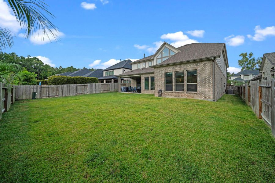 A view highlighting the large backyard.Perfect space to make your own. A view highlighting the large backyard.Perfect space to make your own.