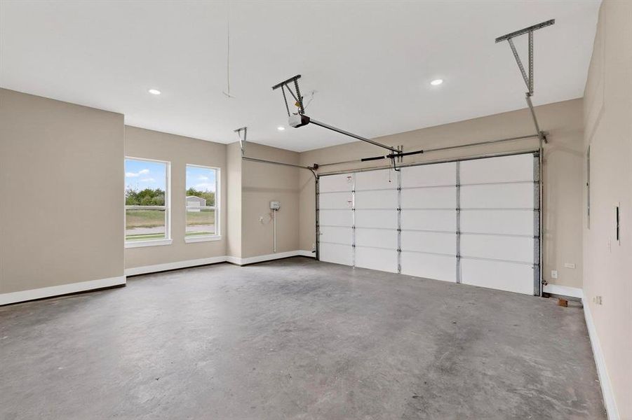 Garage featuring recessed lighting