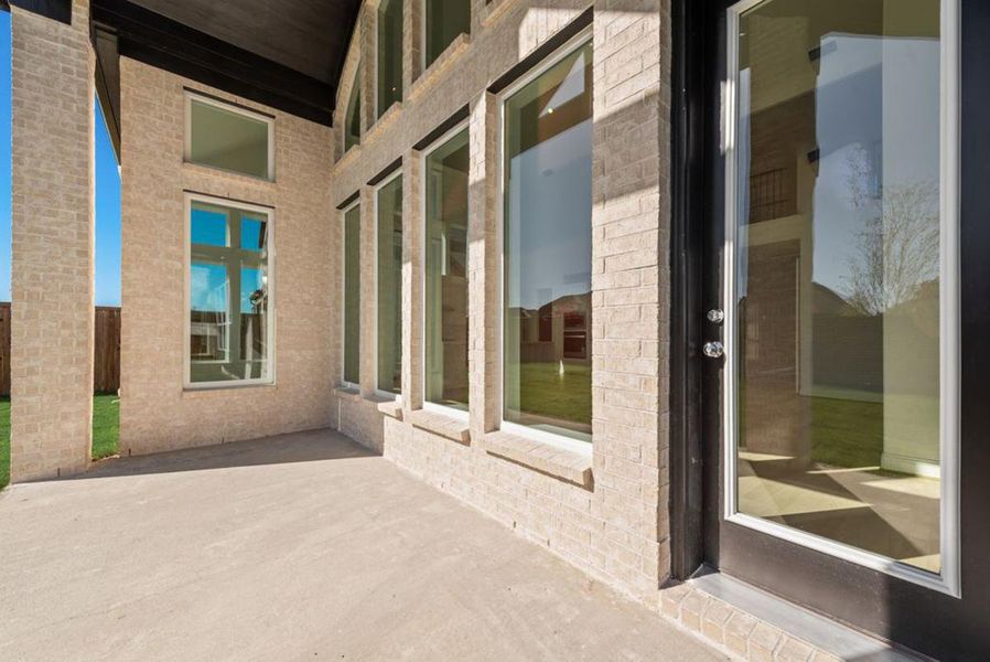 Representative exterior details of a home built from the Grand Silverwood by Grand Homes in Edgewater, Fate (Image 3). Representative exterior details of a home built from the Grand Silverwood by Grand Homes in Edgewater, Fate (Image 3).