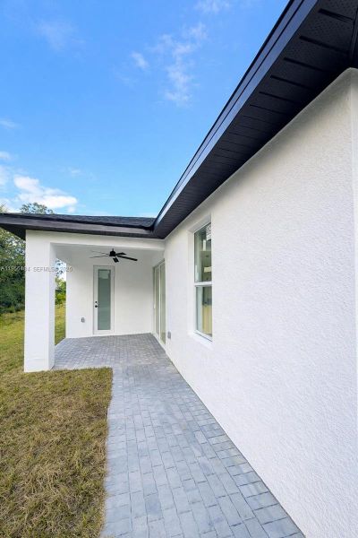 Exterior details and patio area of a home in , Lehigh Acres (Image 3).