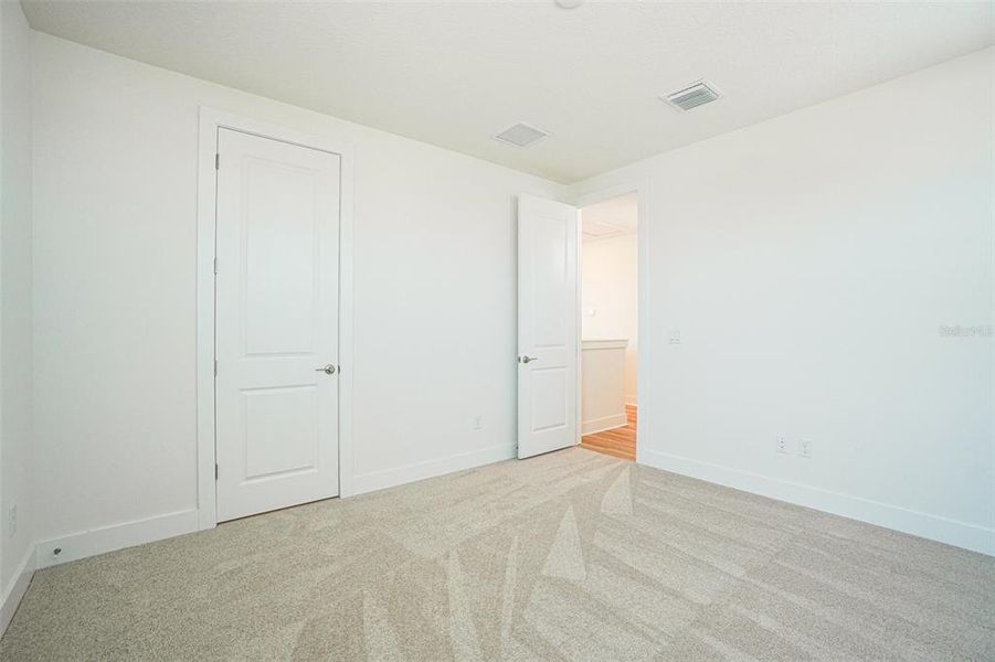 Spacious, unfurnished interior of a new home in Lagoon Residences at Epperson, Wesley Chapel (Image 21).