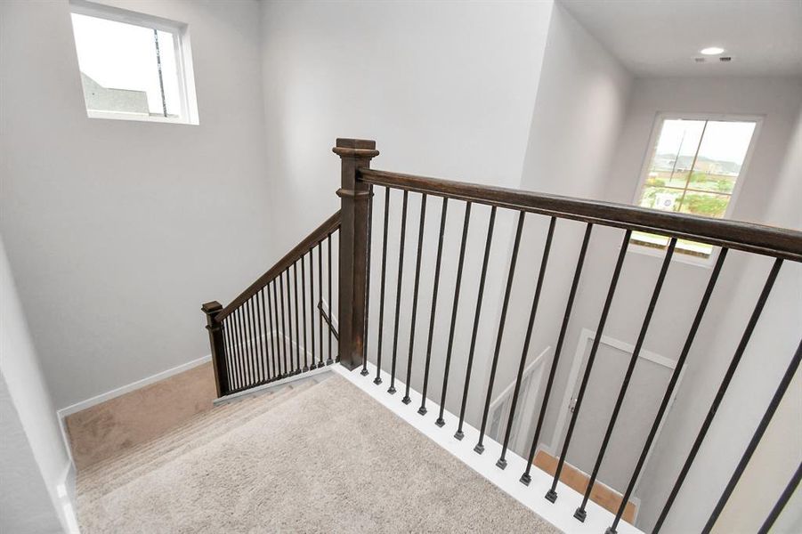 Sample photo of completed home with similar floor plan. Actual colors and selections may vary.