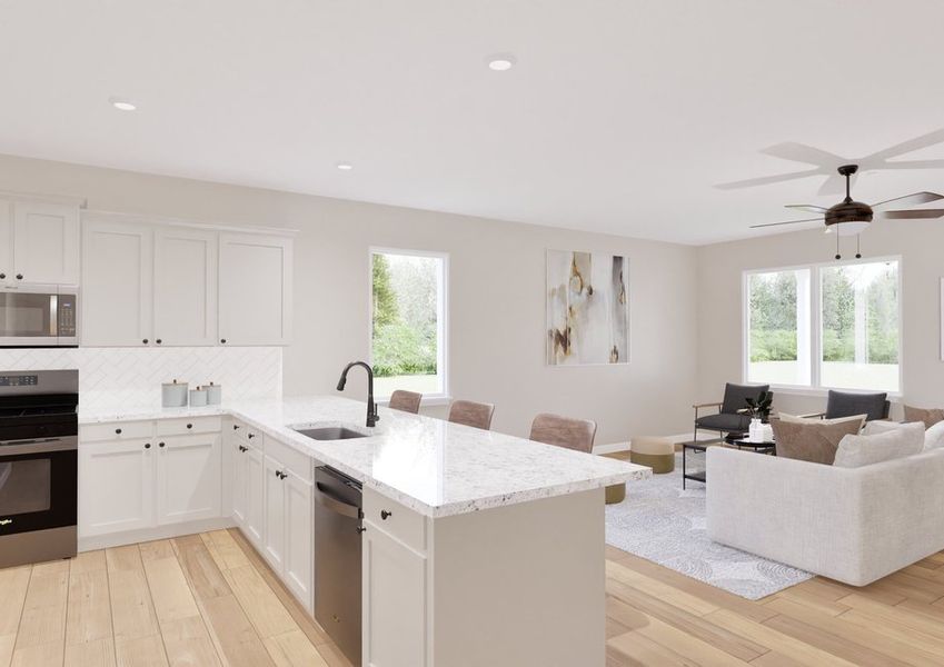 Modern open-concept kitchen and living room with light floors and white cabinets. Modern open-concept kitchen and living room with light floors and white cabinets.