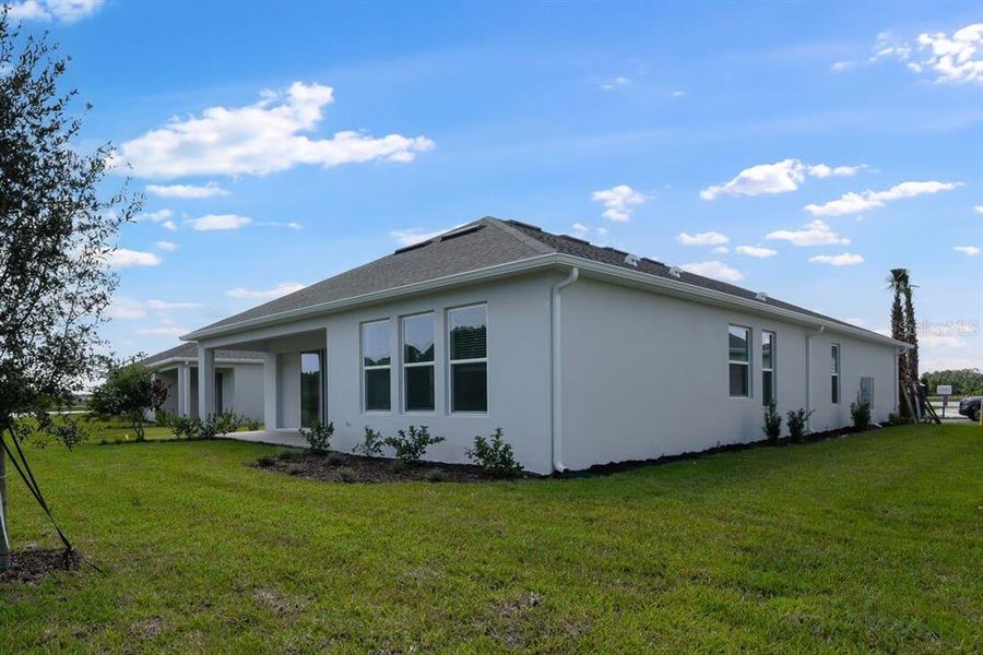 Exterior details and patio area of a home in Ardisia Park, New Smyrna Beach (Image 3). Exterior details and patio area of a home in Ardisia Park, New Smyrna Beach (Image 3).