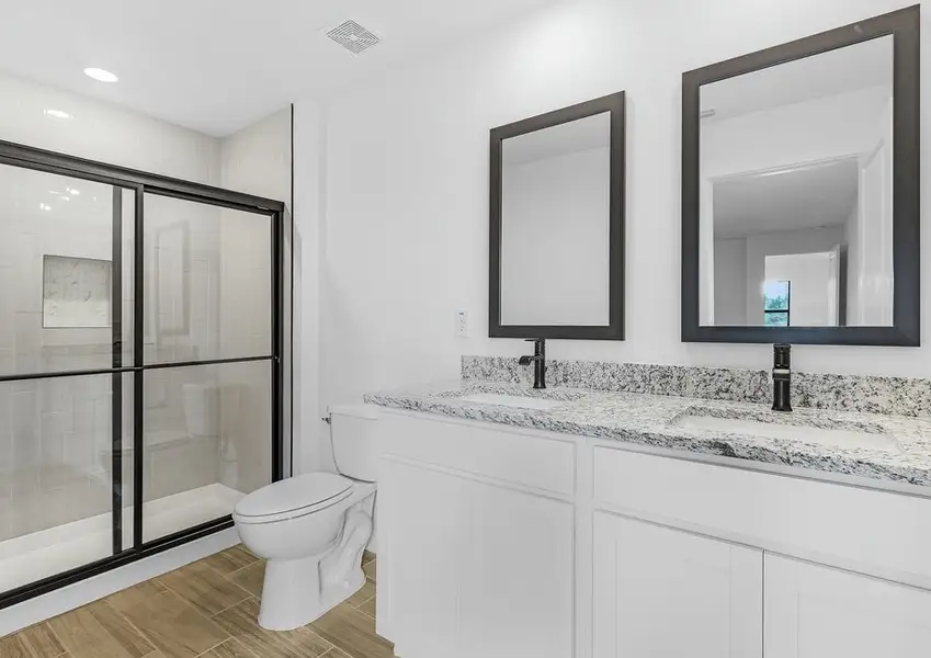 Get ready for your day in the master bathroom