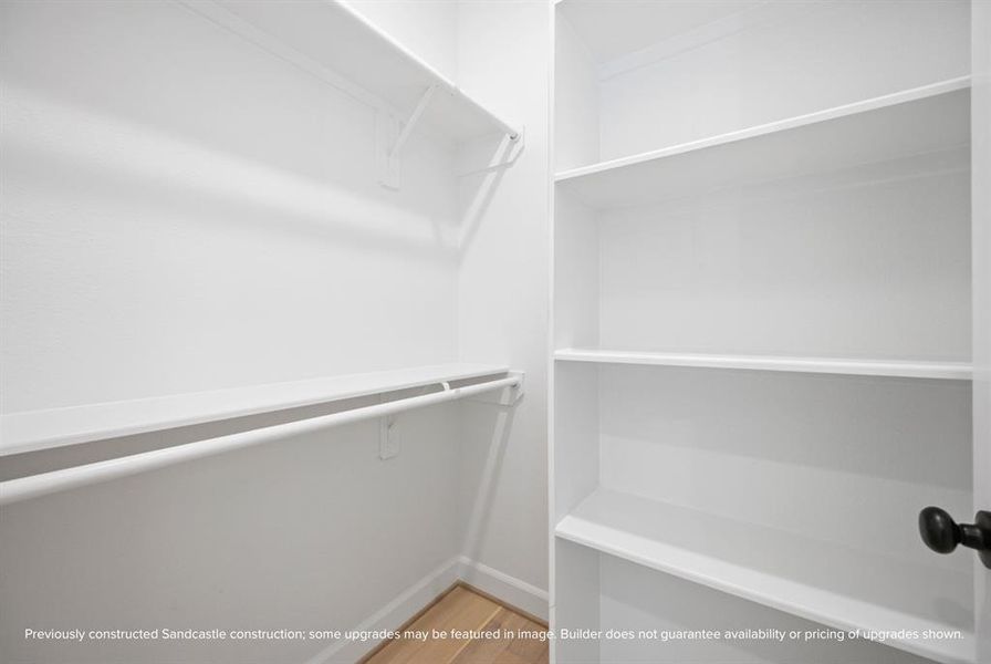 Functional and ample storage included in the garage apartment upgrade, perfect for a tidy and organized living space. Note: previously construction from Sandcastle Homes; some upgrades may be featured in image. Builder does not guarantee availability or pricing of upgrades shown.