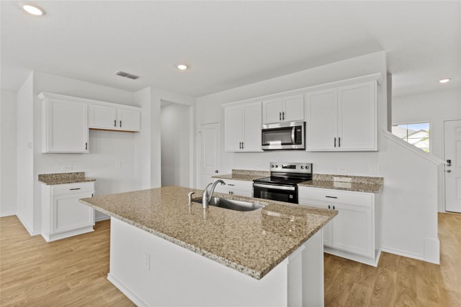 Furnished interior view inside a new home in Palomino, Manor (Image 6).