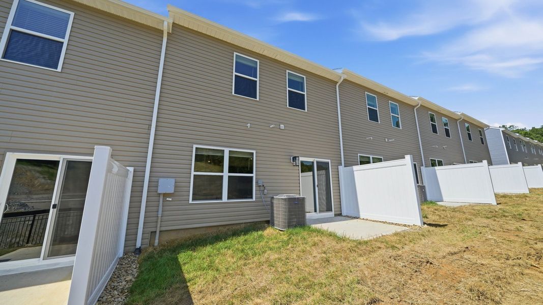 Exterior details and patio area of a home in Cherokee Crossing, Kodak (Image 3).