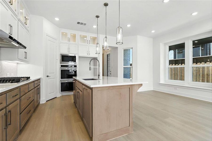 Furnished interior view inside a new home in Walsh: Townhomes - The Patios, Aledo (Image 10). Furnished interior view inside a new home in Walsh: Townhomes - The Patios, Aledo (Image 10).