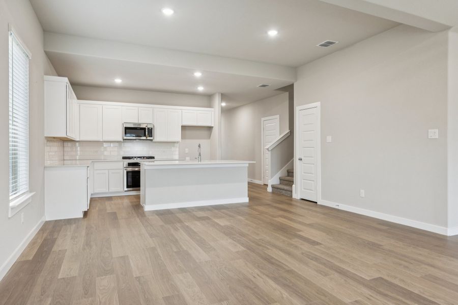 First Floor in the Stanley II home plan by Trophy Signature Homes – REPRESENTATIVE PHOTO