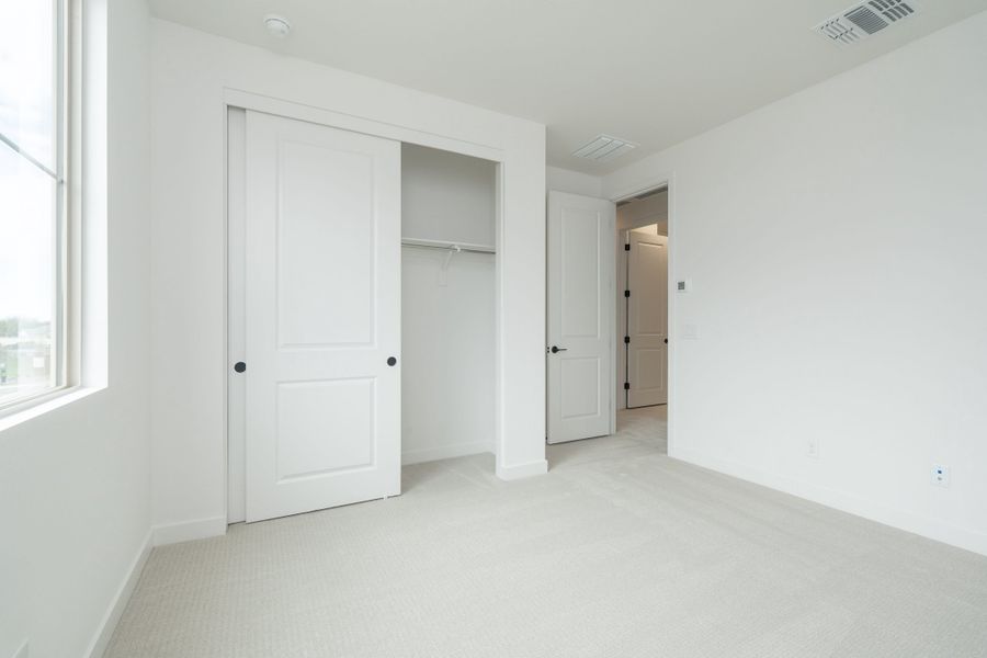 Spacious, unfurnished interior of a new home in Waterston Central, Gilbert (Image 18).