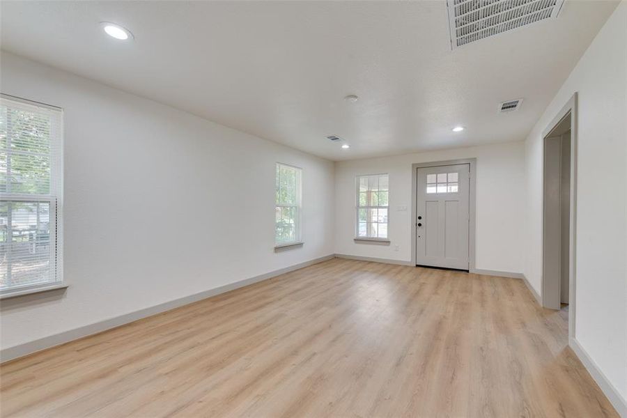 Foyer entrance featuring light hardwood / wood-style flooring