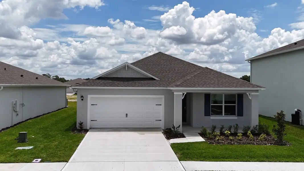Representative exterior photo of a completed home built from the Cali by D.R. Horton in James Landing, Leesburg, FL (Image 2).