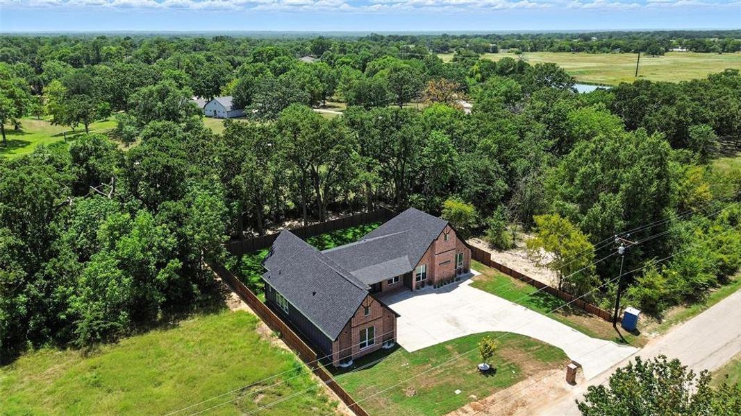 View of subject property with a forest View of subject property with a forest