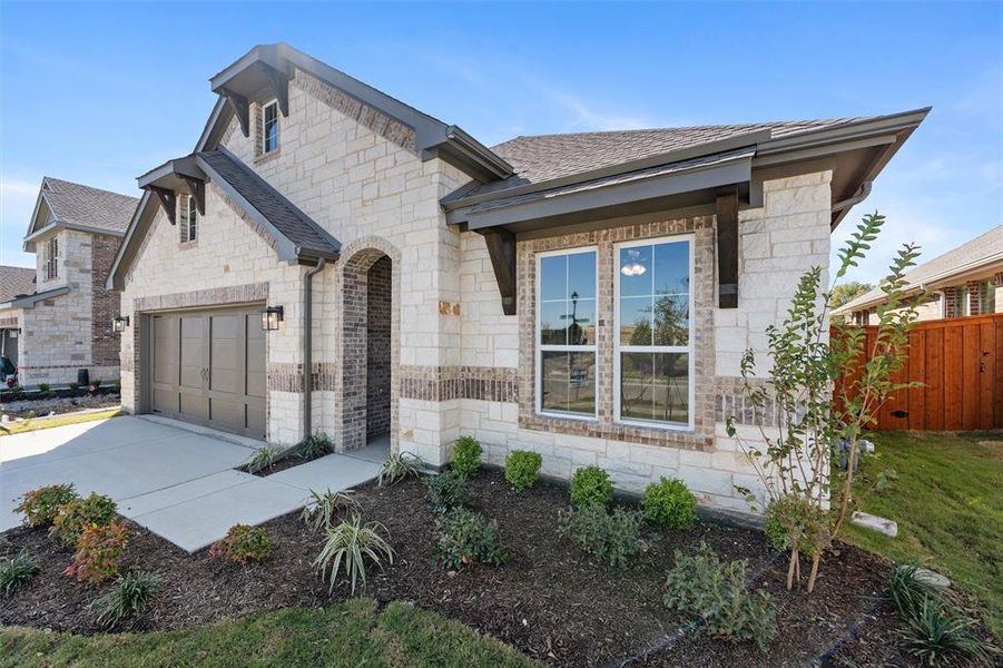 Exterior details and patio area of a home in Morningstar, Aledo (Image 2).