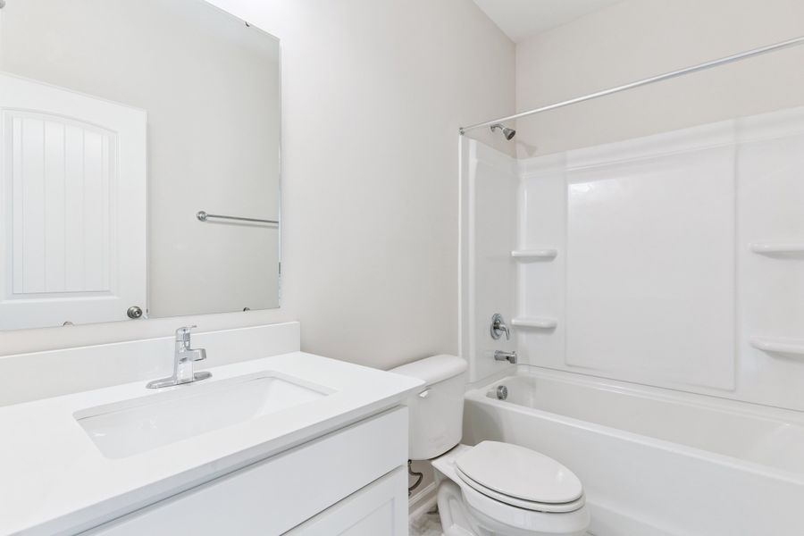 Representative furnished interior of a home built from the The Athens + Bonus Room by Smith Family Homes in NorthShore on the St. Marys River, Kingsland (Image 9).