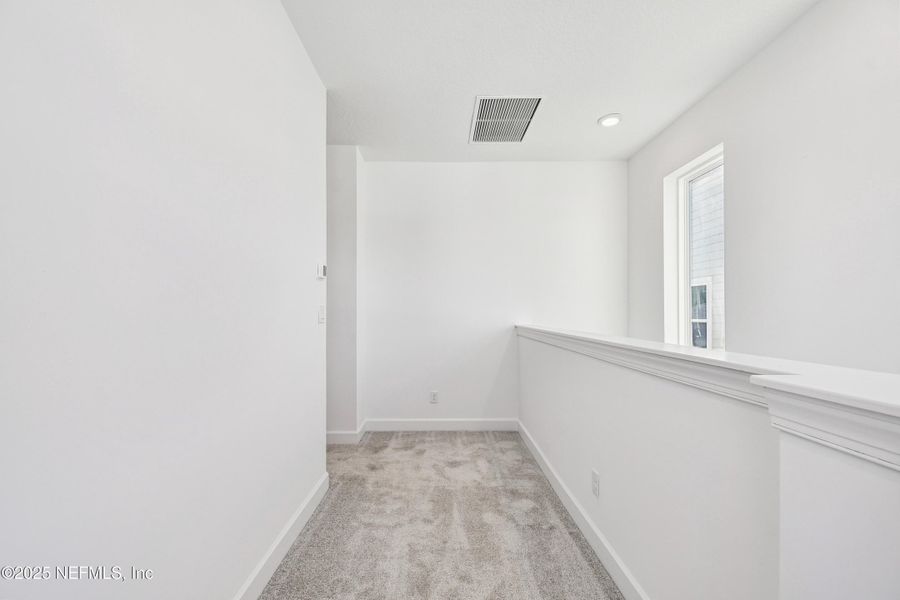 Spacious, unfurnished interior of a new home in Evergreen Island at Silverleaf - Executive, St. Augustine (Image 15). Spacious, unfurnished interior of a new home in Evergreen Island at Silverleaf - Executive, St. Augustine (Image 15).