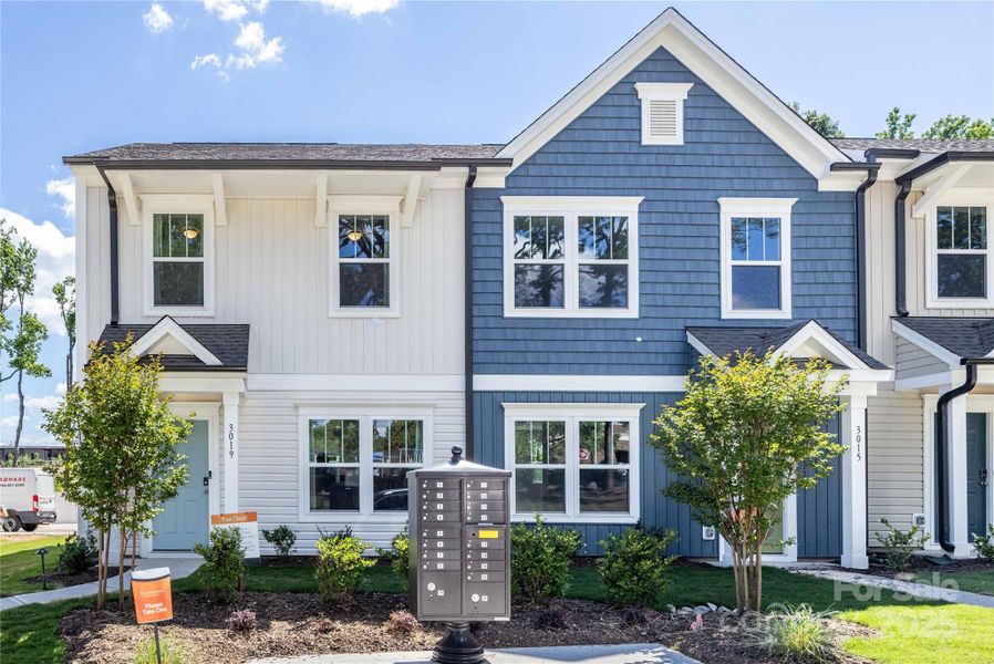 Front exterior of a new home in Dukes Ridge, Charlotte, NC, highlighting curb appeal (Image 1).