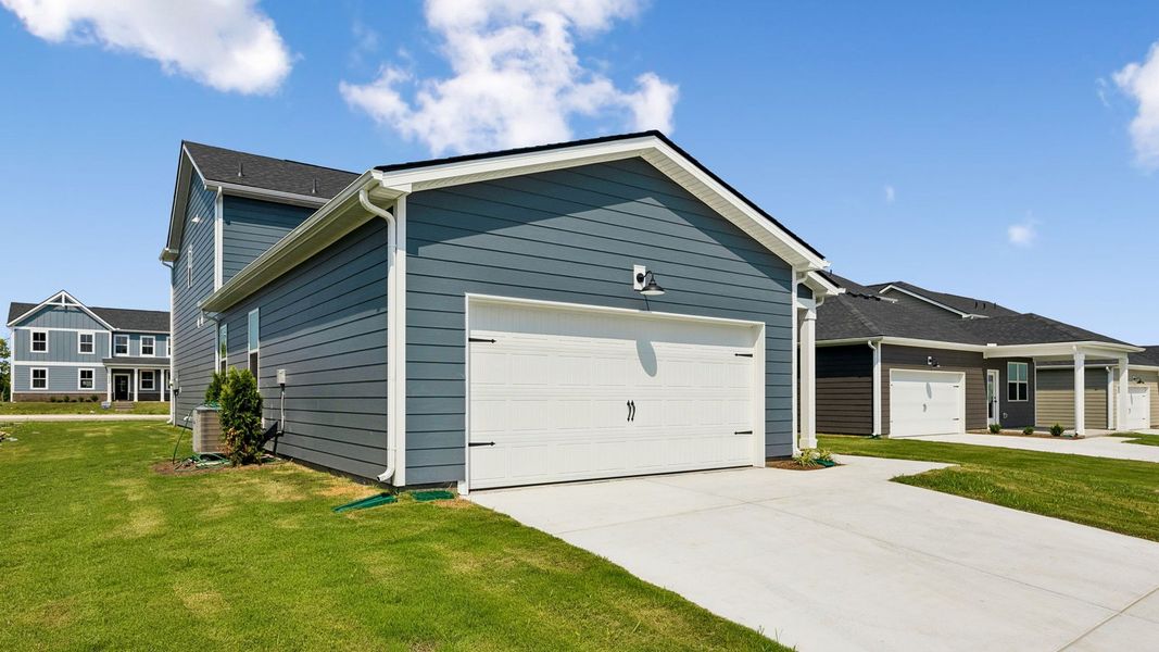 Front exterior of a new home in Reserve at Hickory Ridge, Columbia, TN, highlighting curb appeal (Image 28).