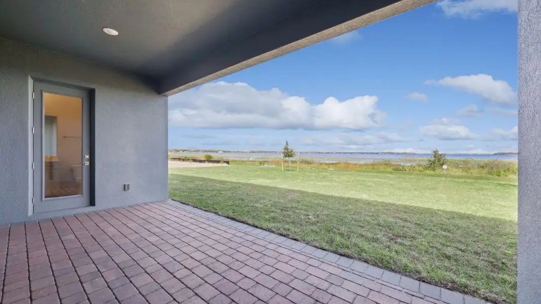 Exterior details and patio area of a home in Buena Lago, St. Cloud (Image 2).