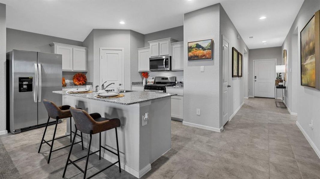 Kitchen - All Home and community information, including pricing, included features, terms, availability and amenities, are subject to change at any time without notice or obligation. All Drawings, pictures, photographs, video, square footages, floor plans, elevations, features, colors and sizes are approximate for illustration purposes only and will vary from the homes as built.