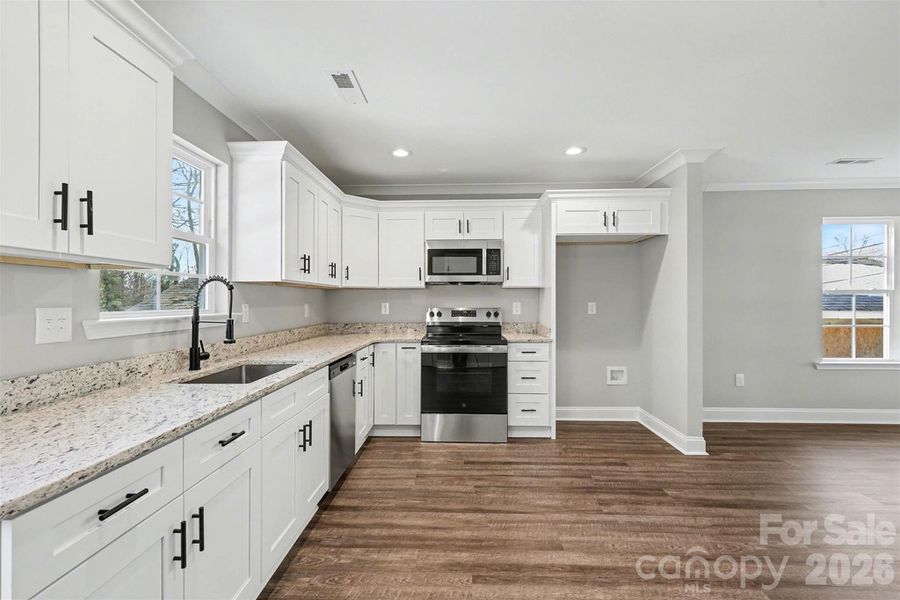 Furnished interior view inside a new home in , High Point (Image 7).