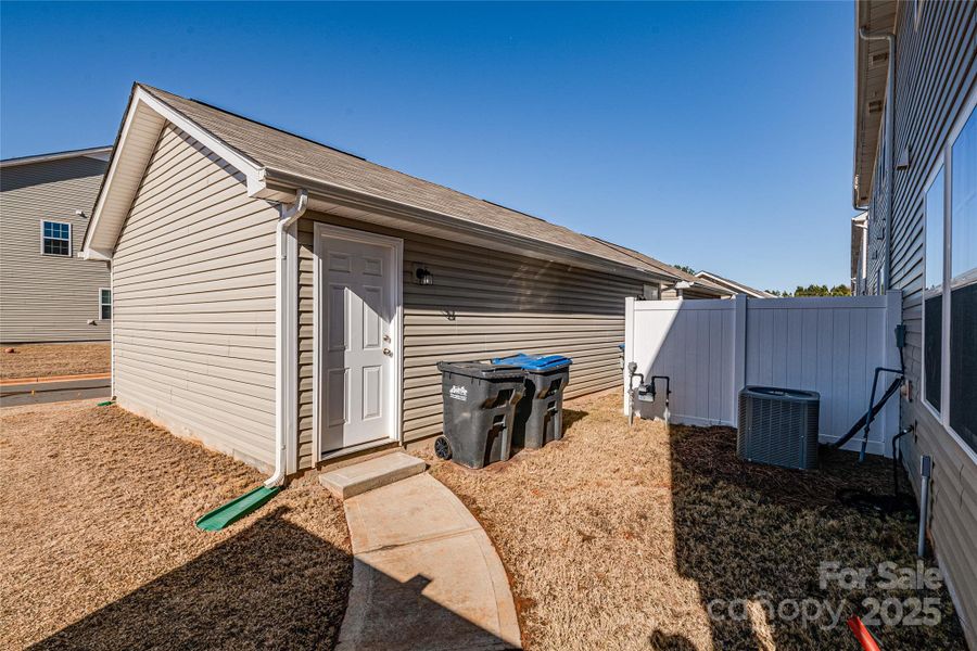 Exterior details and patio area of a home in , Charlotte (Image 2). Exterior details and patio area of a home in , Charlotte (Image 2).