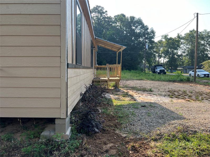 Front exterior of a new home in , Cleveland, TX, highlighting curb appeal (Image 22). Front exterior of a new home in , Cleveland, TX, highlighting curb appeal (Image 22).