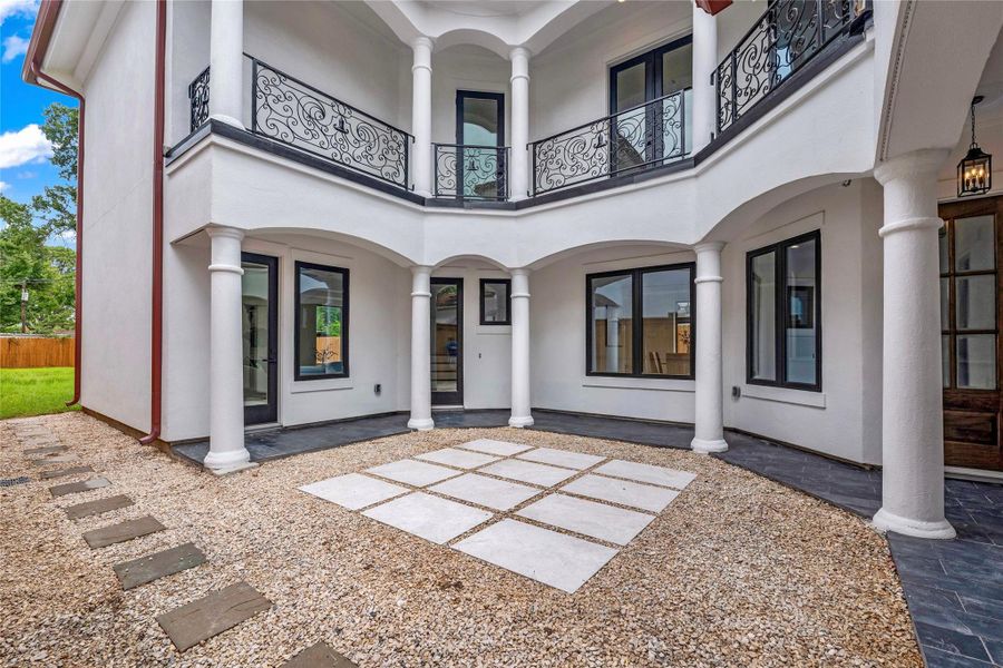 Nearly every room in the home has views of the elegant corridor.