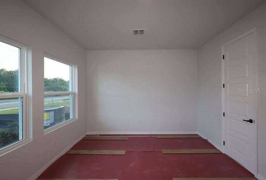 In-progress construction of a new home in Lakeside at Satilla, St. Cloud, FL (Image 9).