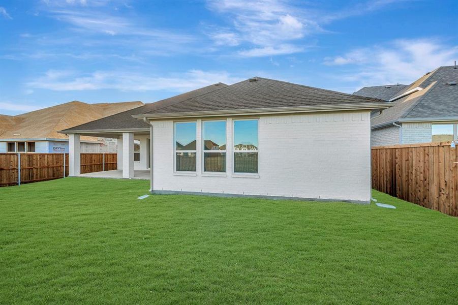 Exterior details and patio area of a home in Wellington, Fort Worth (Image 3).