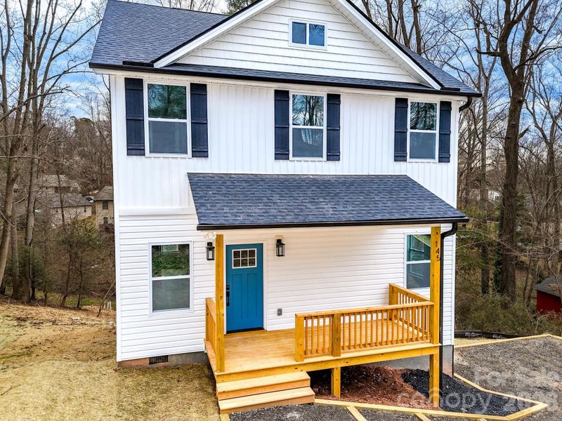 Exterior details and patio area of a home in , Asheville (Image 28).