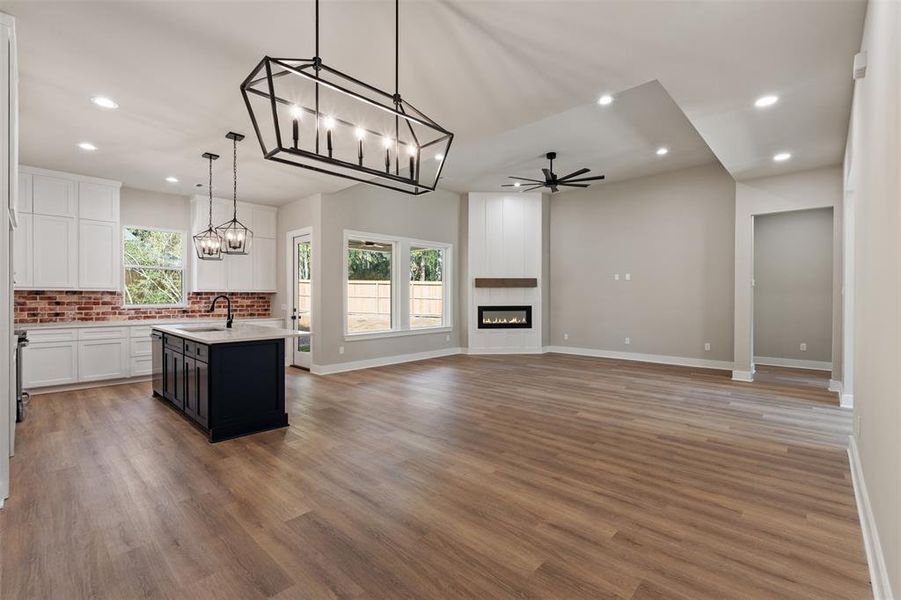 This Large Space really flows, Luxury Vinyl Plank on the Floors.