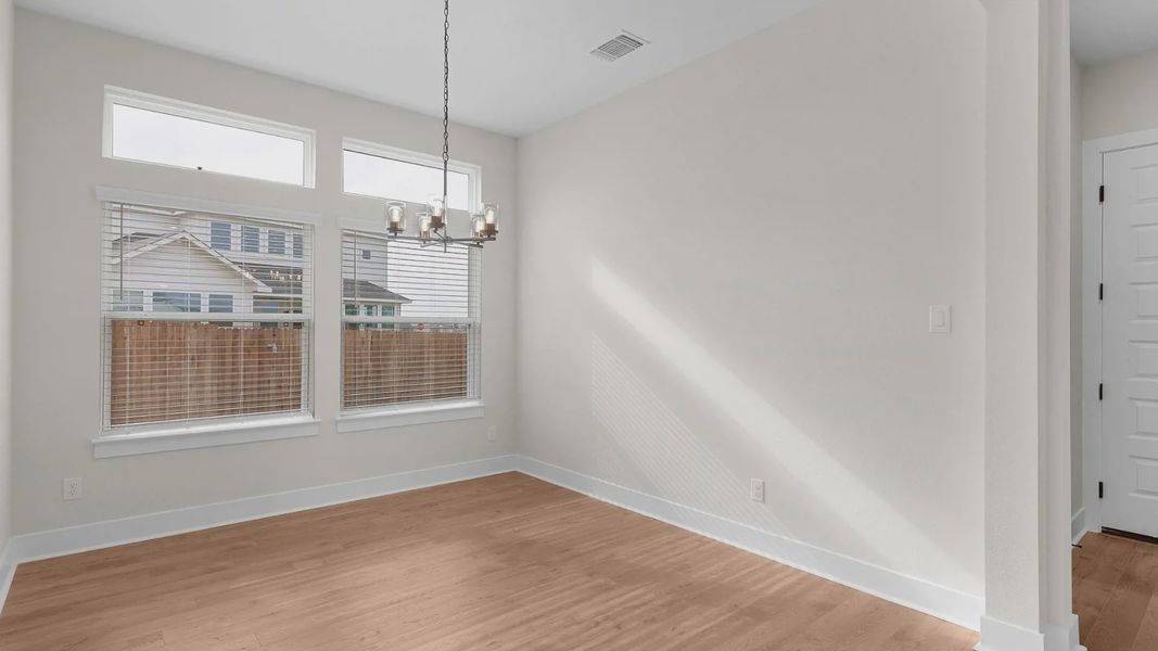 Spacious, unfurnished interior of a new home in The Grove at Blackhawk, Pflugerville (Image 13).