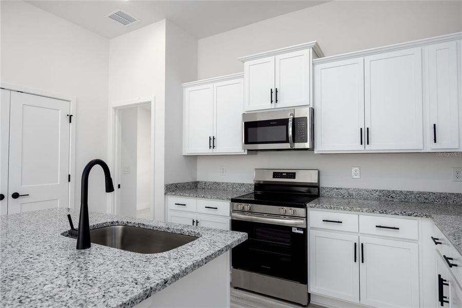 Furnished interior view inside a new home in Briarwood, Alachua (Image 16).