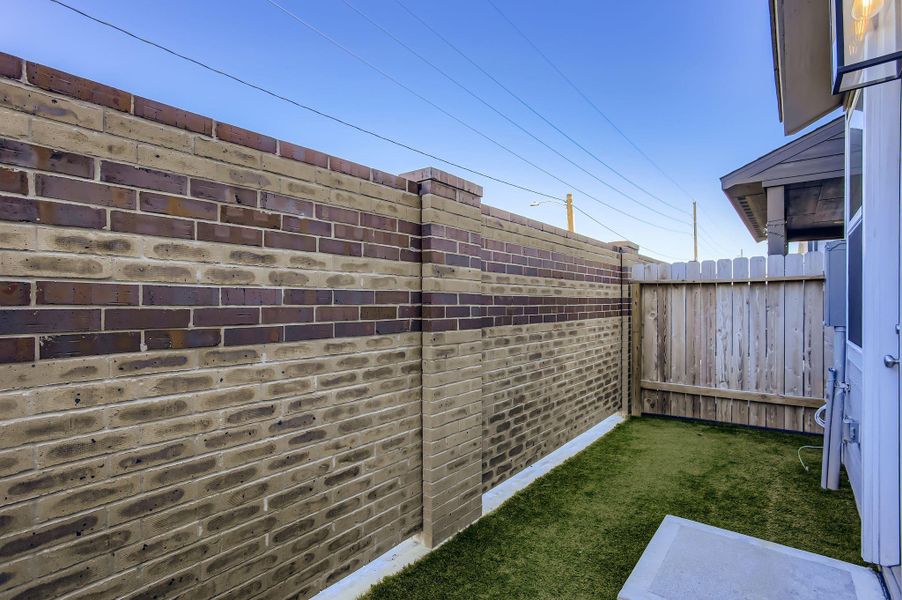 Exterior details and patio area of a home in , Houston (Image 4).