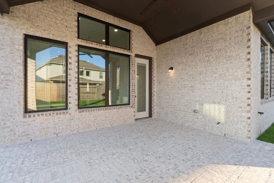 Exterior details and patio area of a home in Artavia, Conroe (Image 3). Exterior details and patio area of a home in Artavia, Conroe (Image 3).